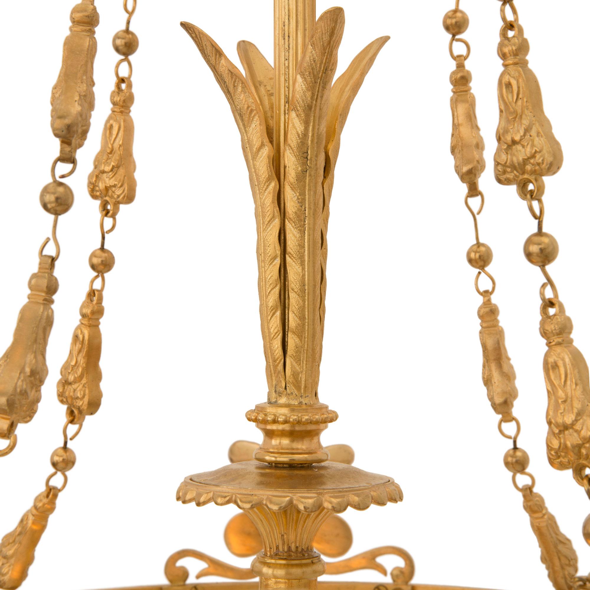 French 19th Century Louis XVI St. Ormolu and Frosted Glass Chandelier For Sale 2