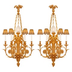 French 19th century Louis XVI st. Ormolu and frosted Glass chandeliers