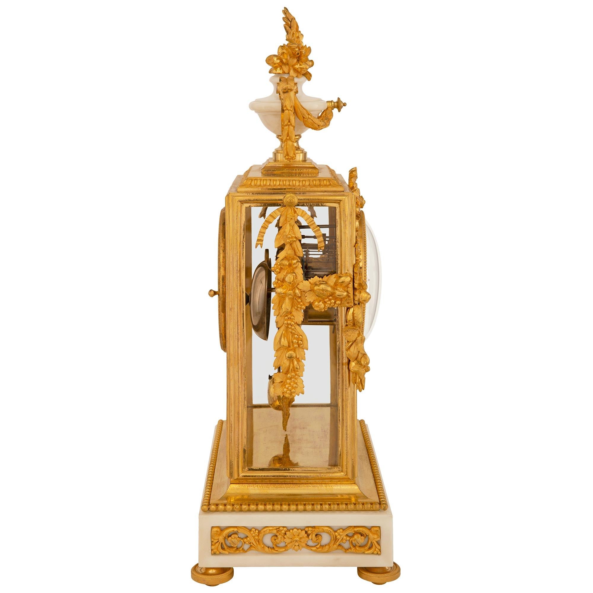 French 19th Century Louis XVI St. Ormolu And Marble Clock, Signed Marnyhac In Good Condition In West Palm Beach, FL