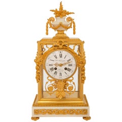 Französische Uhr aus Goldbronze und Marmor im Louis-XVI-Stil des 19. Jahrhunderts, signiert Marnyhac