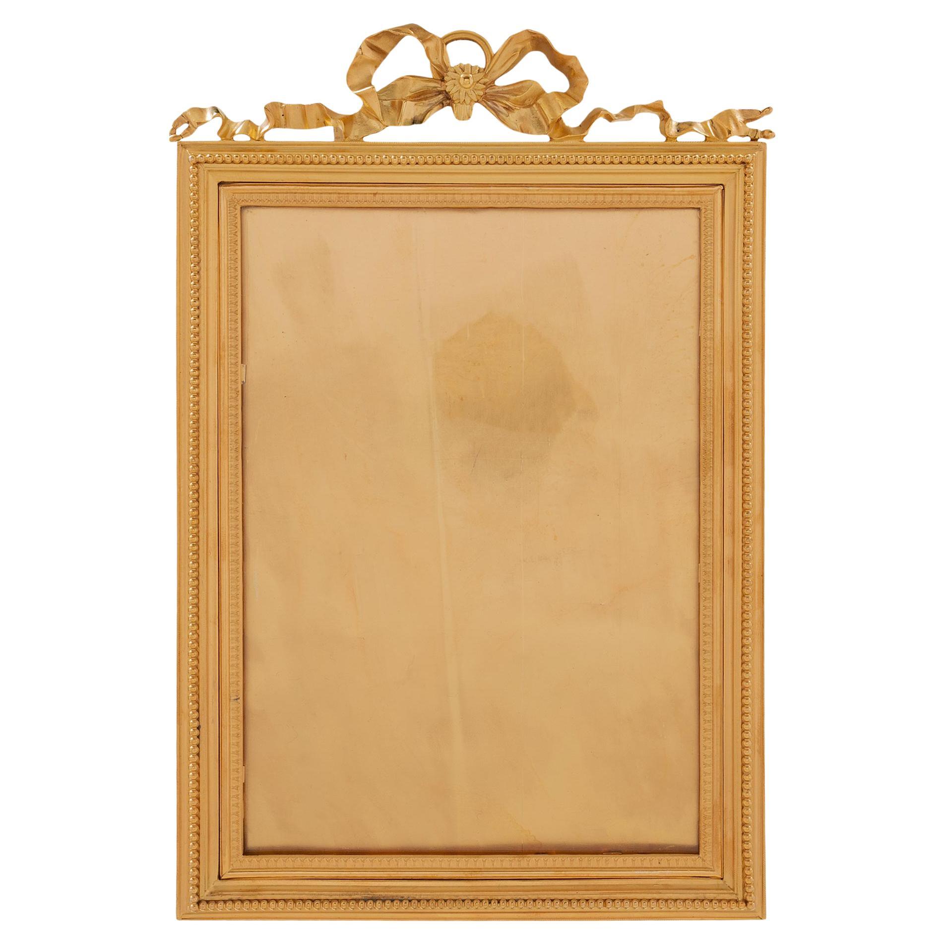 Cadre en bronze doré de style Louis XVI du 19ème siècle français