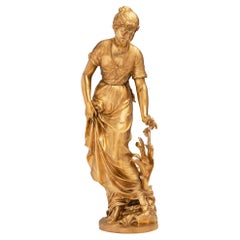 Statue d'une belle jeune fille en bronze doré de style Louis XVI du 19ème siècle français