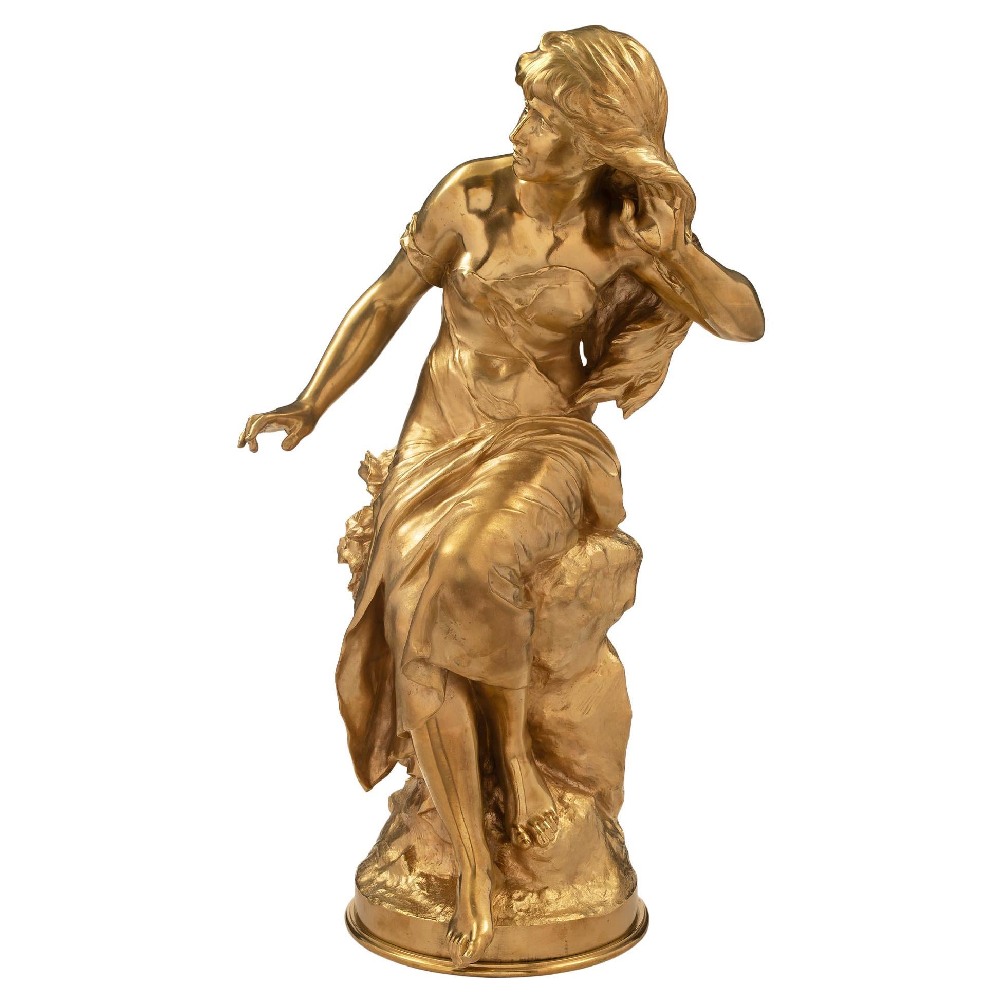 Statue d'une dame en bronze doré de style Louis XVI du 19ème siècle par Moreau