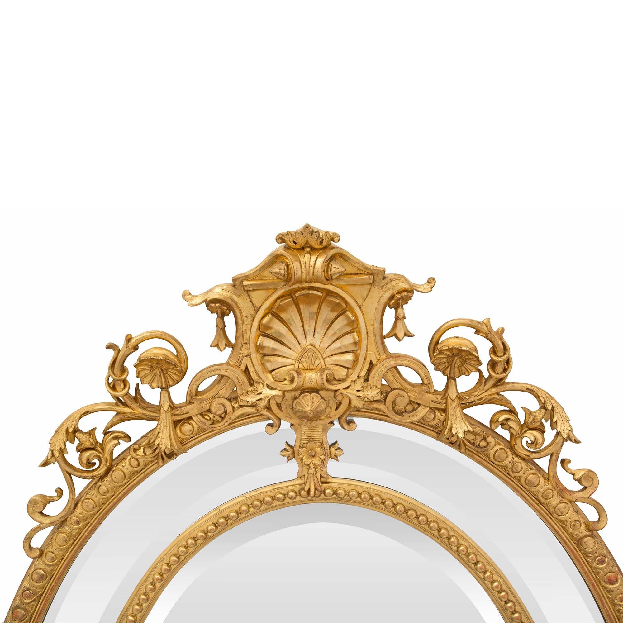 French 19th Century Louis XVI St. Oval Double Framed Giltwood Mirror In Good Condition For Sale In West Palm Beach, FL