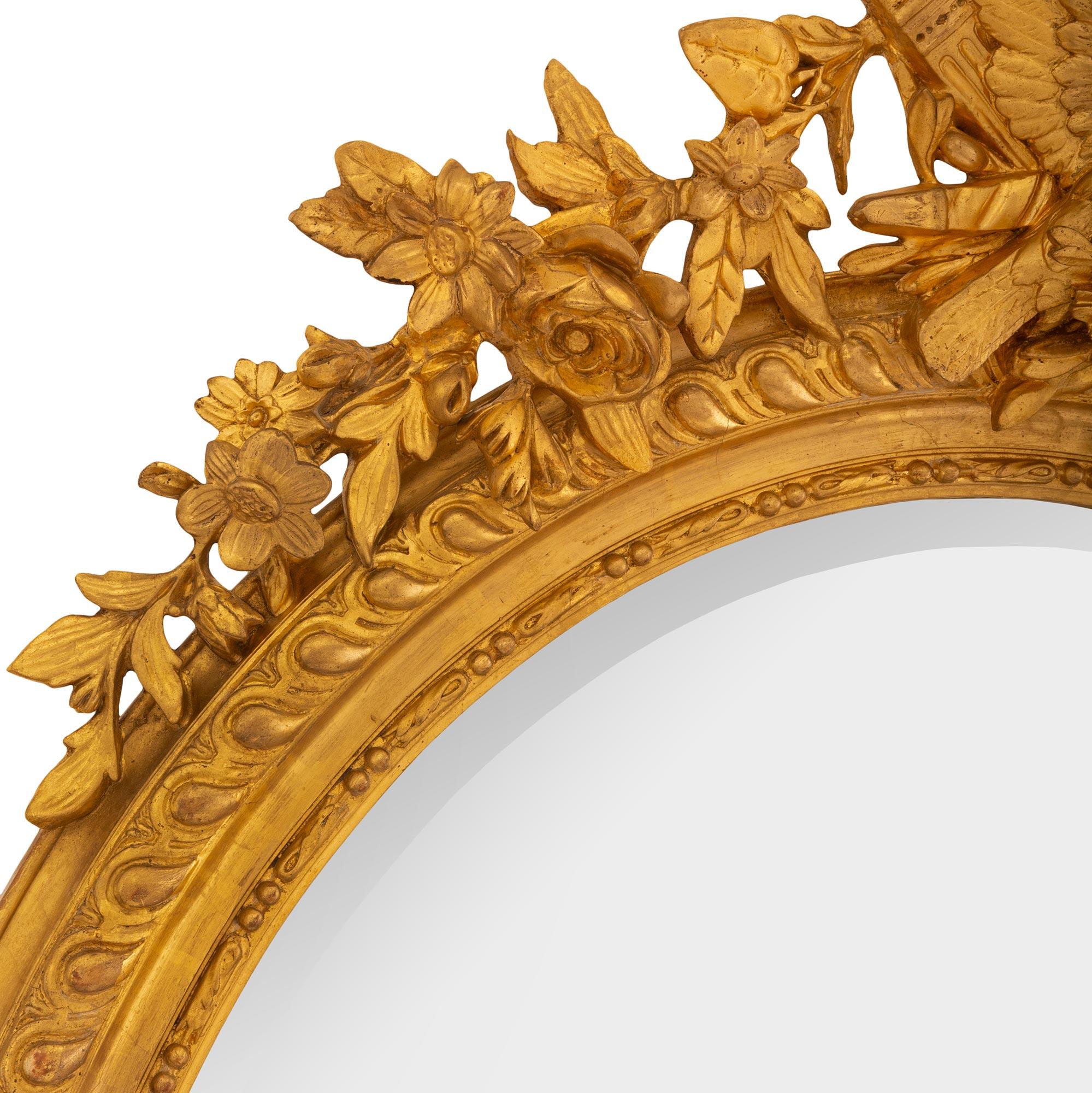 Ovaler Spiegel aus vergoldetem Holz im Louis-XVI-Stil, 19. Jahrhundert (Französisch) im Angebot