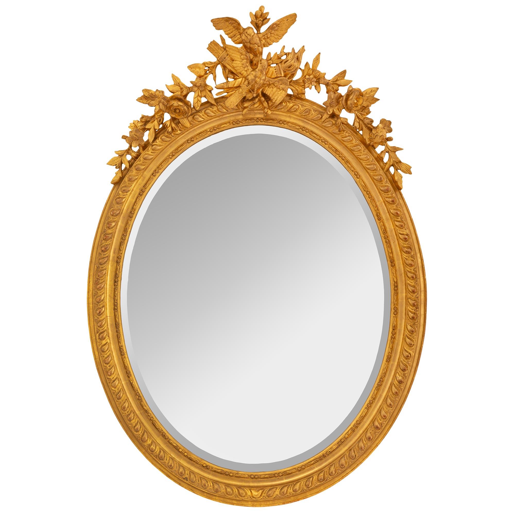 Miroir ovale de style Louis XVI du 19ème siècle en bois doré français en vente 2