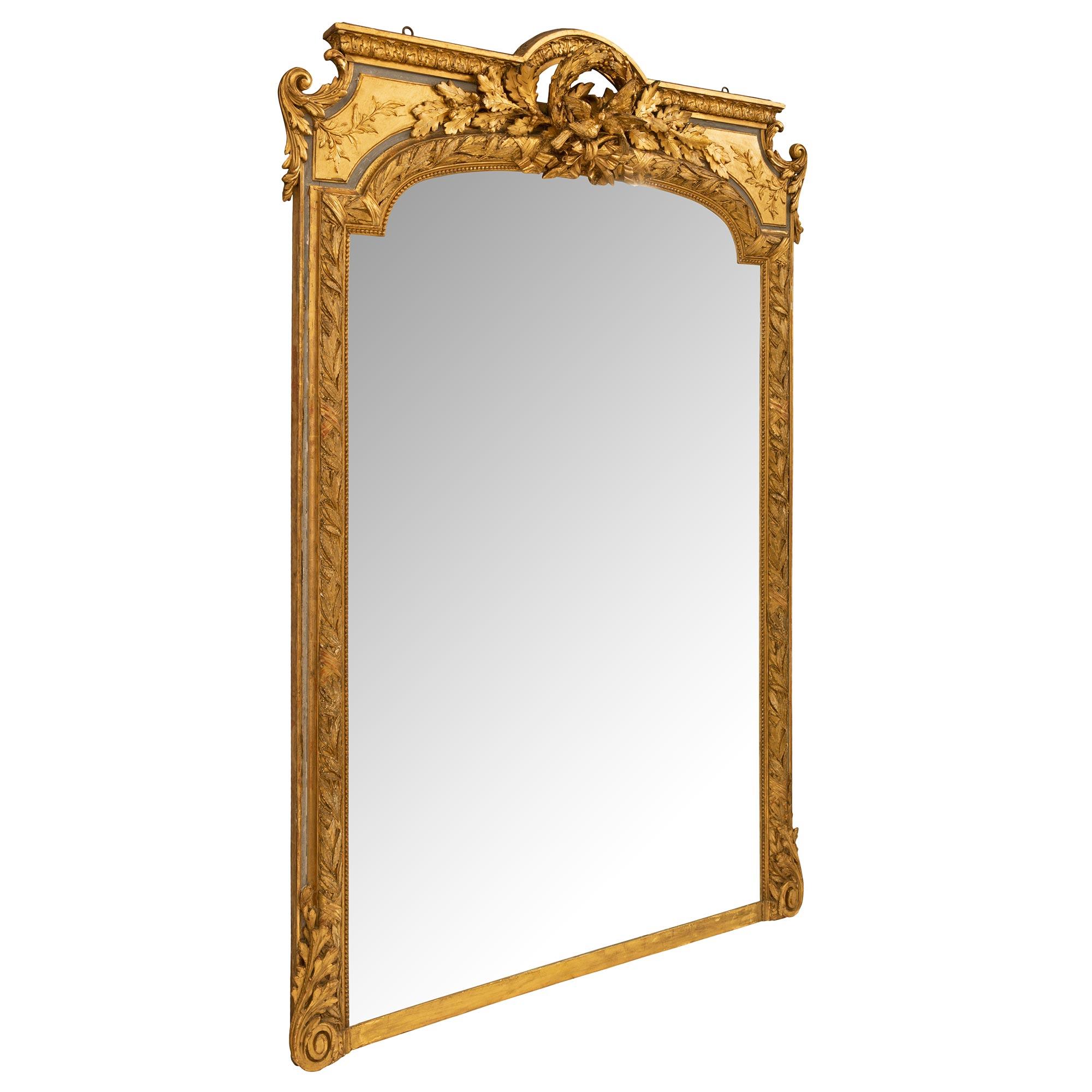 French 19th Century Louis XVI St. Patinated And Giltwood Mirror In Good Condition For Sale In West Palm Beach, FL