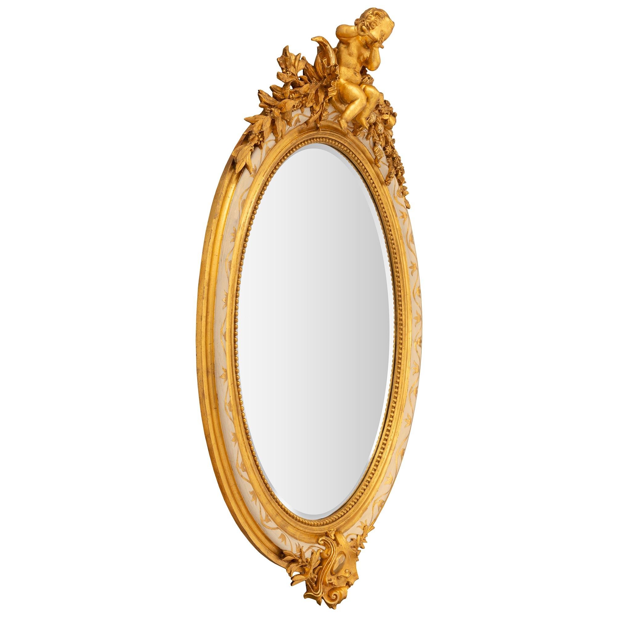 French 19th Century Louis XVI St. Patinated and Giltwood Mirror In Good Condition For Sale In West Palm Beach, FL