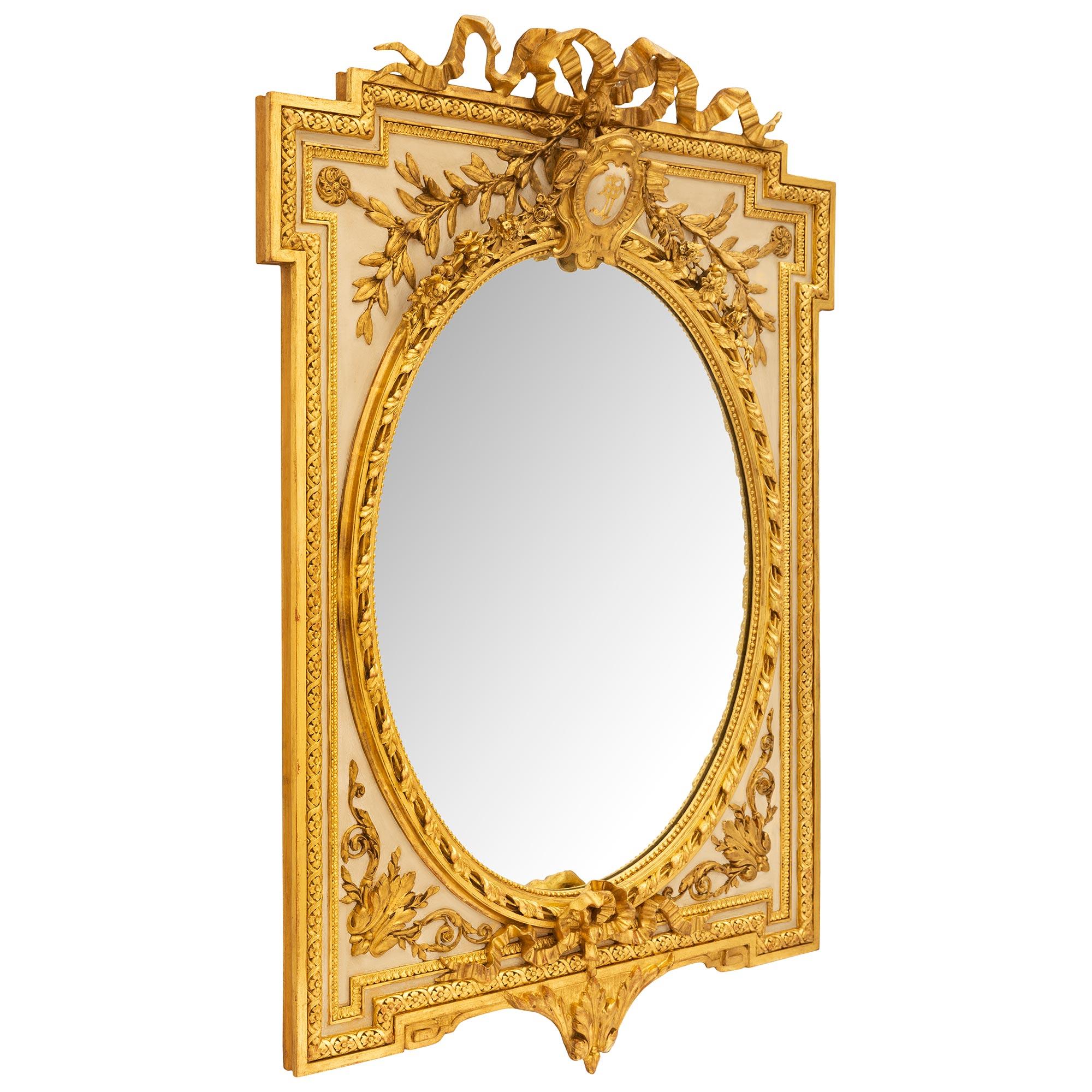 French 19th Century Louis XVI St. Patinated And Giltwood Mirror In Good Condition For Sale In West Palm Beach, FL