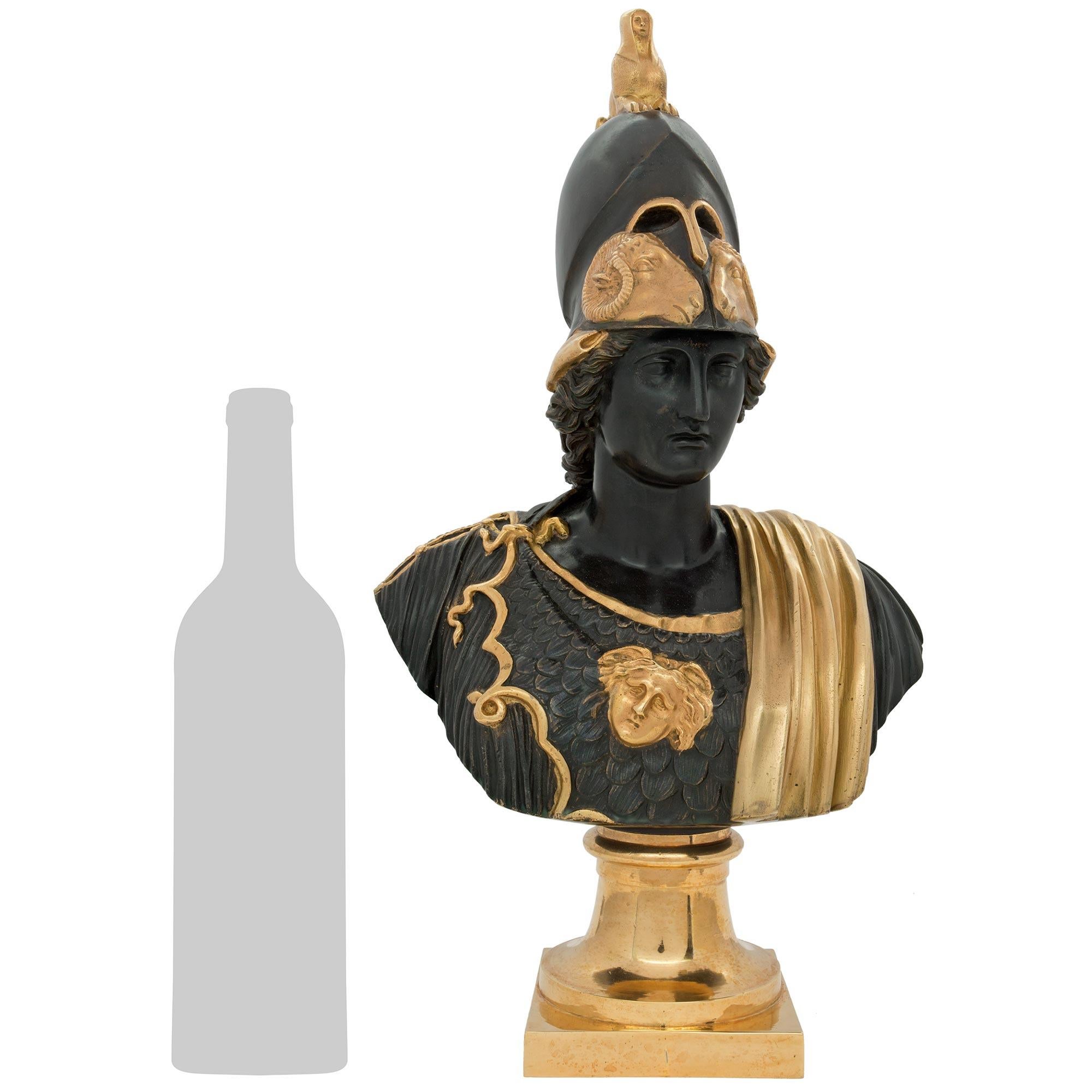 A striking and high quality French 19th century Louis XVI st. patinated Bronze and Ormolu bust of Pericles. This handsome bust is raised on a square Ormolu base below the tapered socle pedestal. Pericles is dressed in his celebratory armor with a