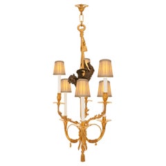 Antique French 19th century Louis XVI st. patinated Bronze and Ormolu chandelier