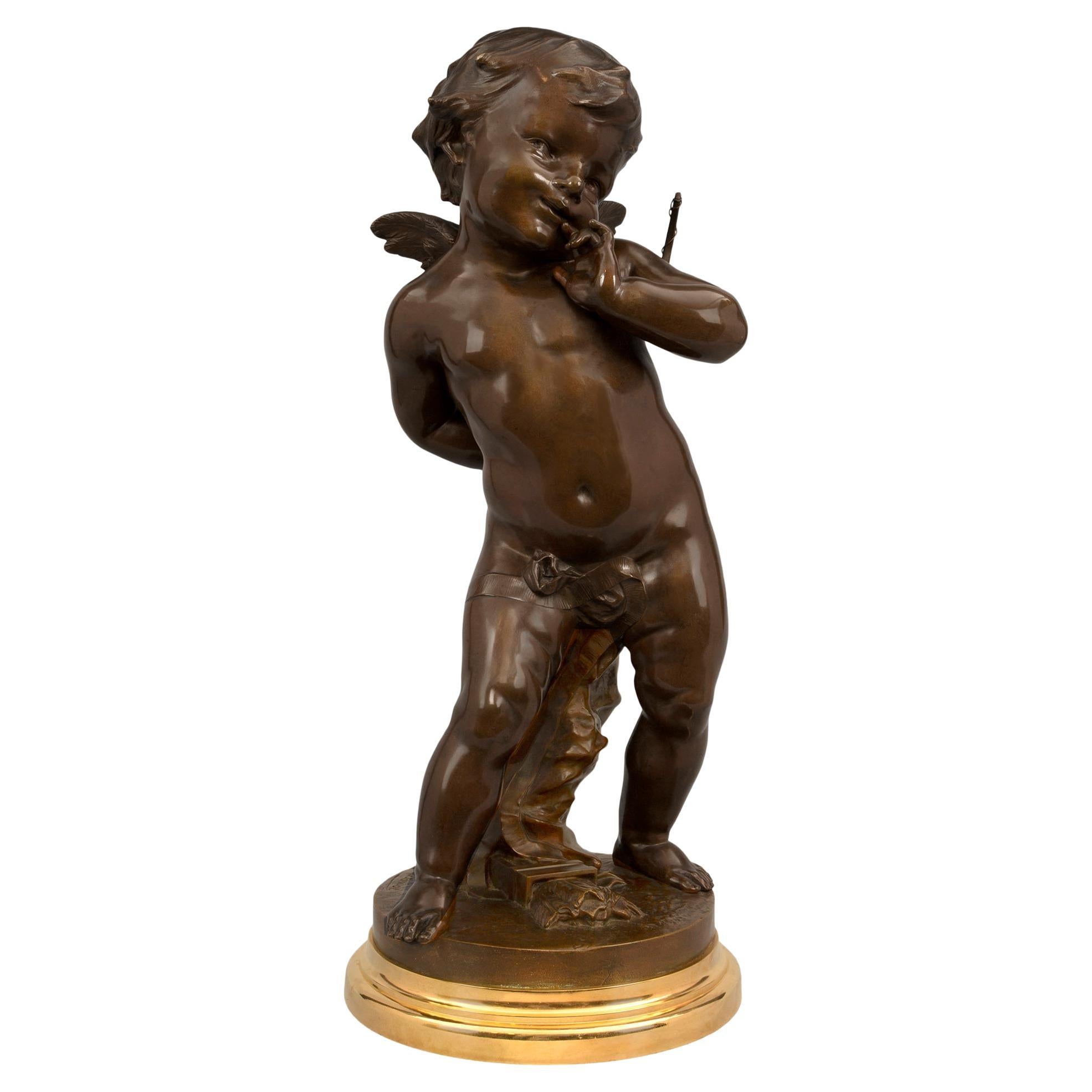 Statue française du XIXe siècle de style Louis XVI en bronze patiné et bronze doré en vente