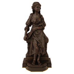 French 19th century Louis XVI st. patinated Bronze and Ormolu statue