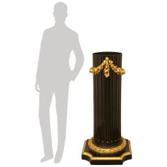 French 19th century Louis XVI st. patinated Wood and Giltwood pedestal