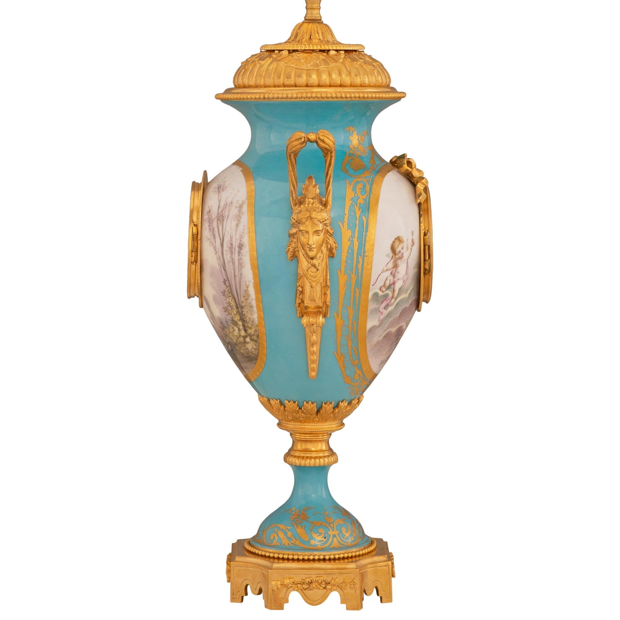 French 19th Century Louis XVI St. Sèvres Porcelain And Ormolu Clock Lamp For Sale 1