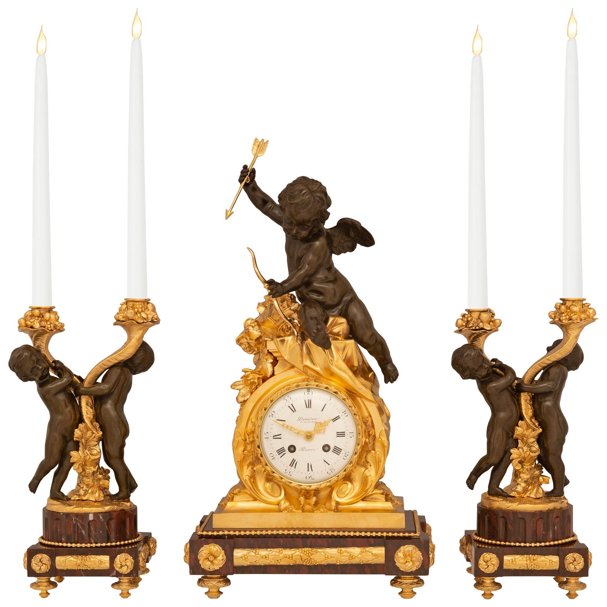 Garniture trois pièces Louis XVI du 19ème siècle, signée Denière en vente