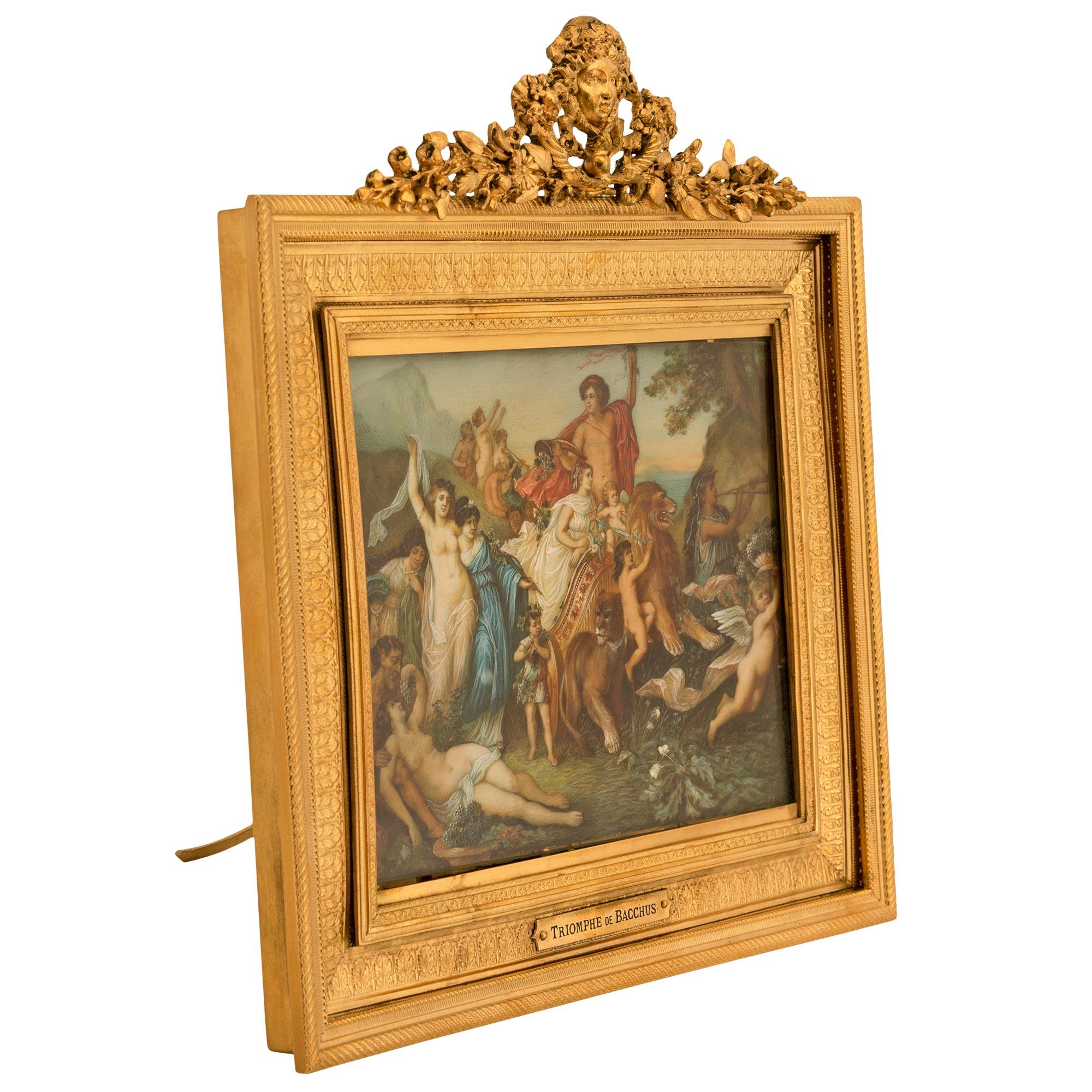 A beautiful small scale French 19th century Louis XVI st. watercolor painting in its original ormolu frame. The painting titled Triomphe de Bacchus (Triumph of Bacchus) depicts wonderfully executed personages celebrating with a beautiful maiden in a