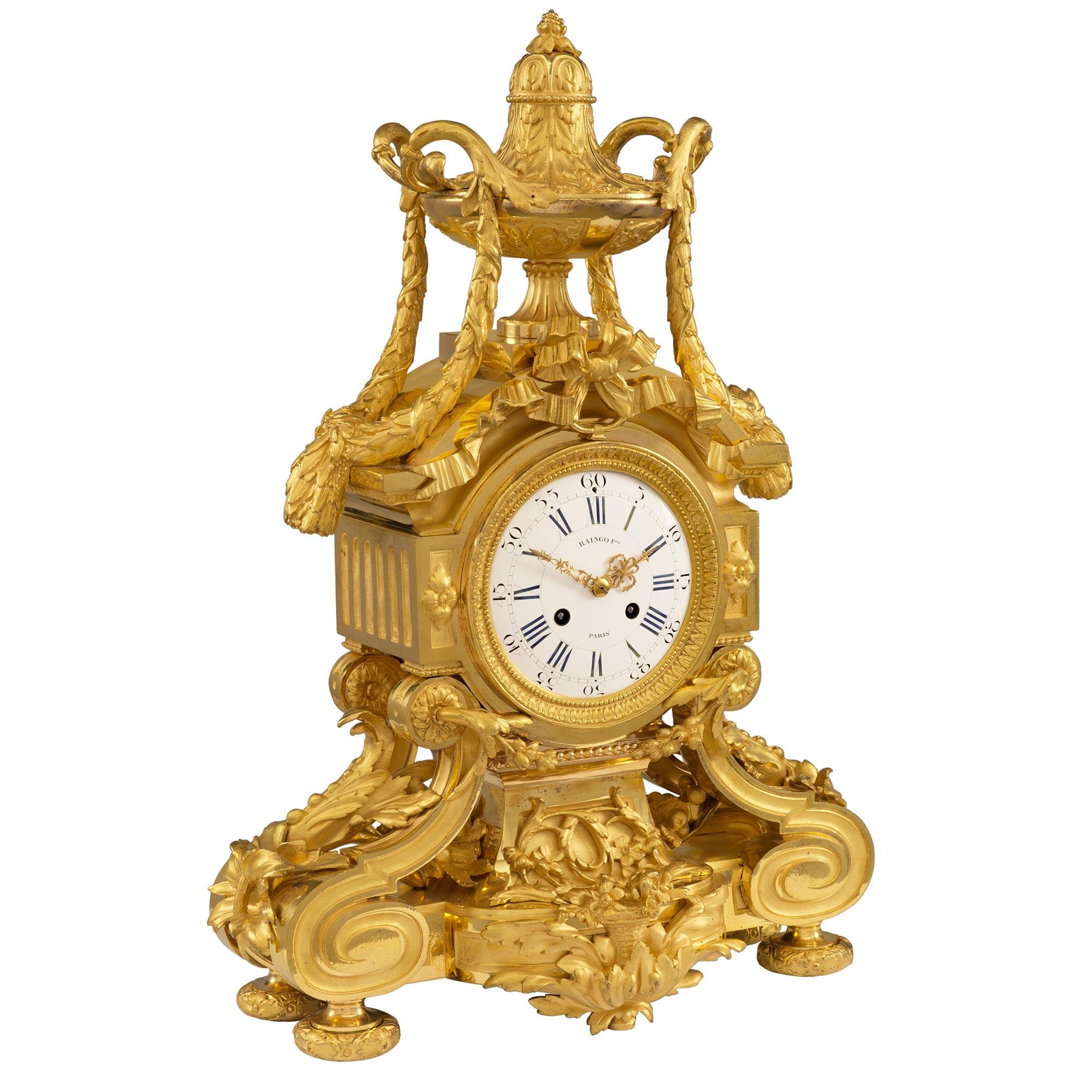 A striking and high quality French 19th century Louis XVI st. Belle Époque period ormolu clock signed by Raingo Frères. The clock is raised by lovely mottled feet with a floral design. Below the clock face is a stunning and richly chased acanthus