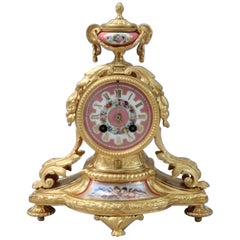 French 19th Century Louis XVI Style Bronze Gilt and Porcelain Mantel Clock