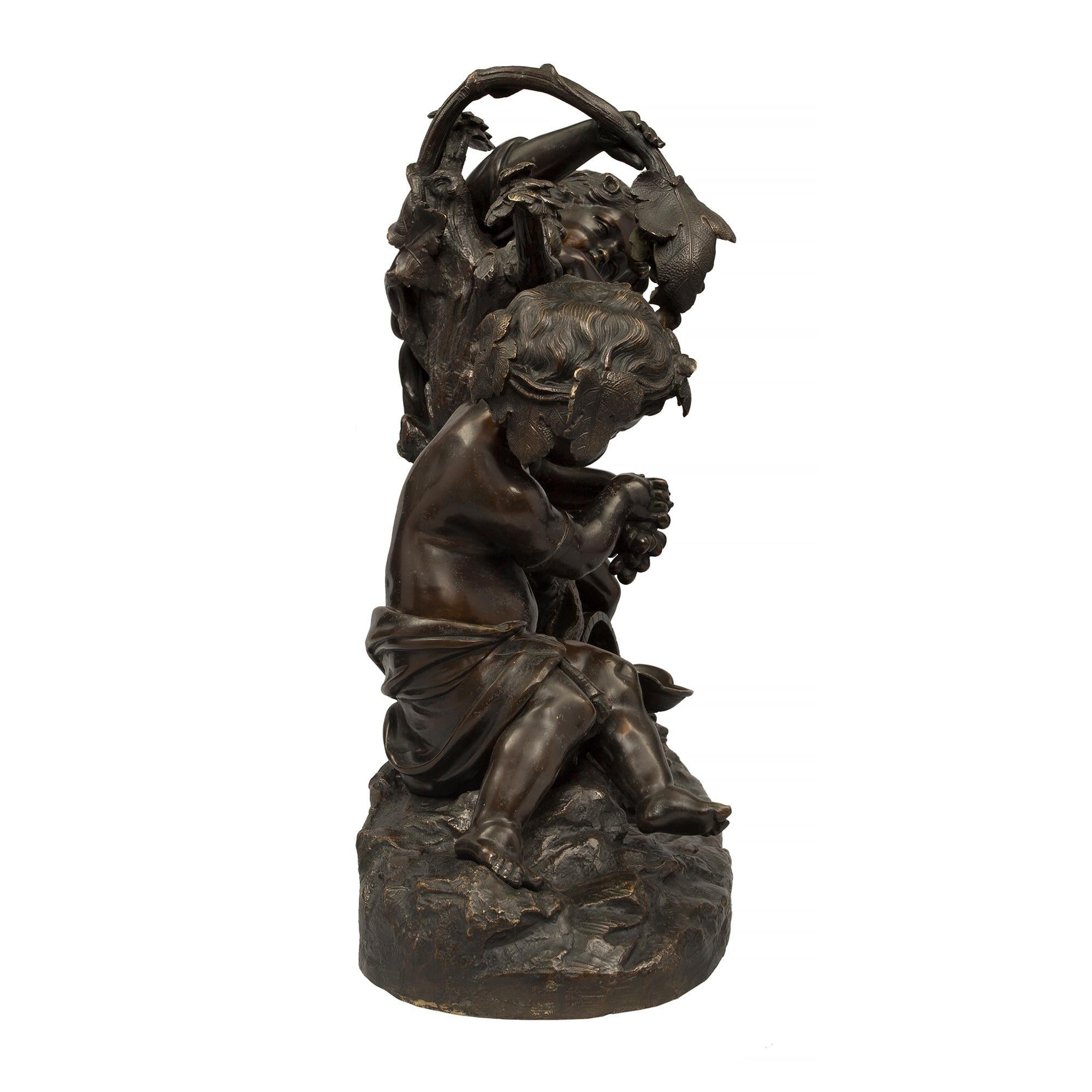 Patinated French 19th Century Louis XVI Style Bronze Statue of Two Cherubs, Signed Clodion For Sale