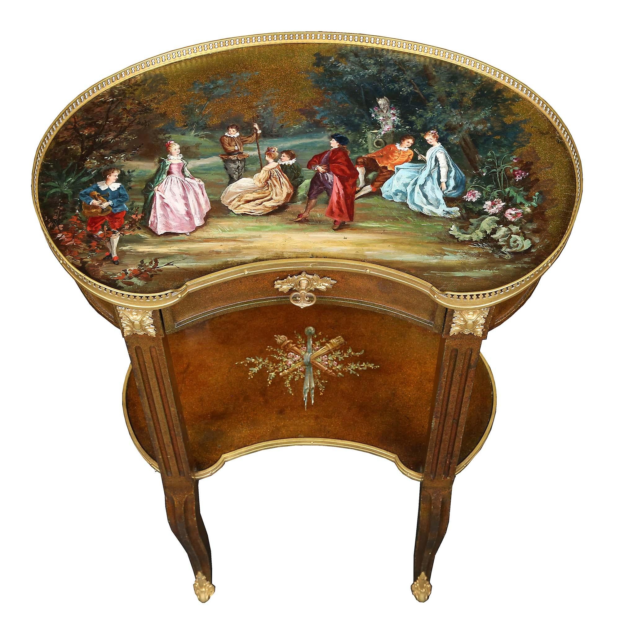 A very attractive French 19th century Louis XVI st., circa 1880, finely executed hand painted side table. Raised on cabriole legs with ormolu sabots joined by a kidney shaped tier with ormolu trim and central painted floral bouquet, with flame of