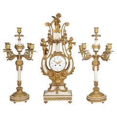 French 19th Century Louis XVI style clock set.