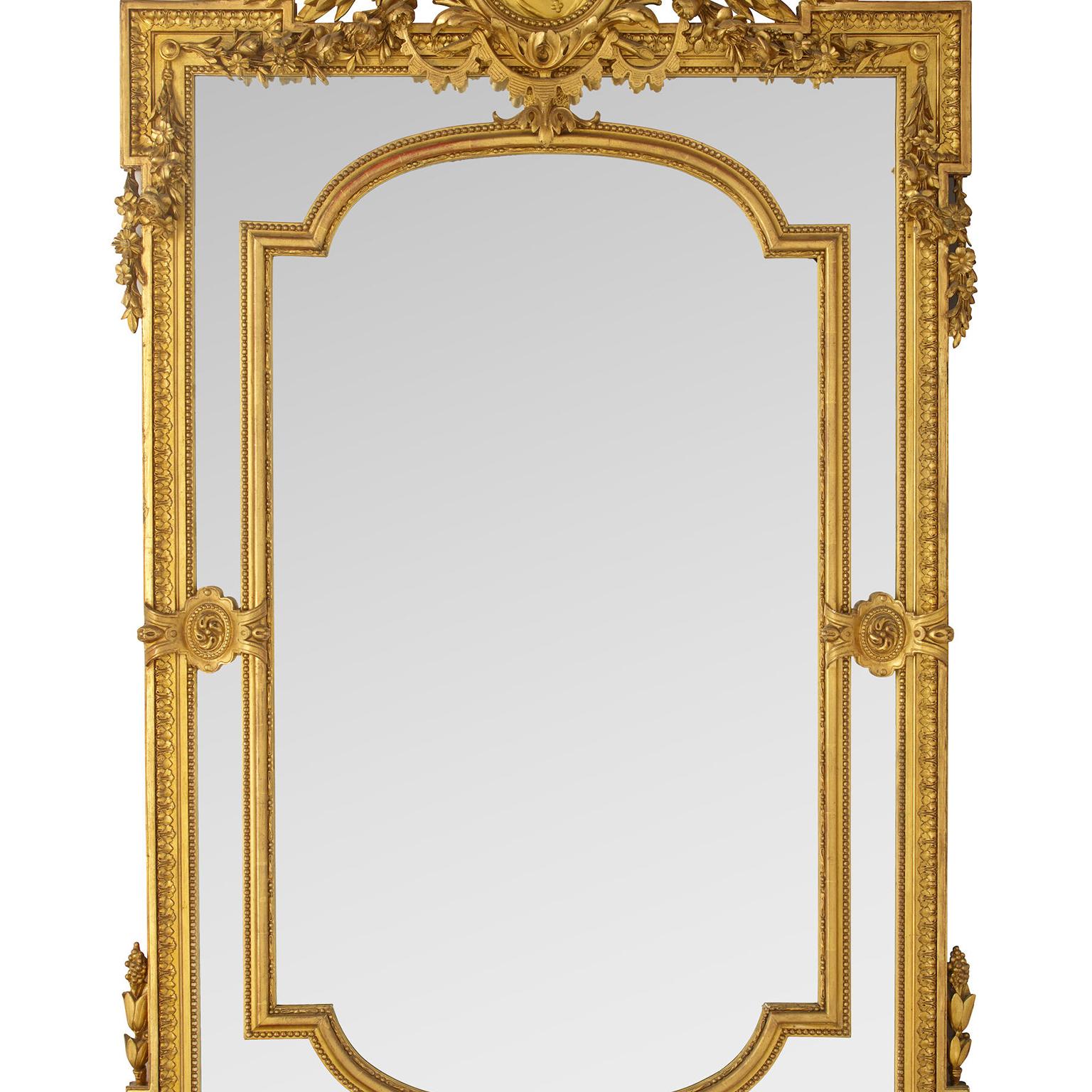 Early 20th Century French 19th Century Louis XVI Style Gilt-Wood and Gilt-Gesso Carved Pier Mirror For Sale