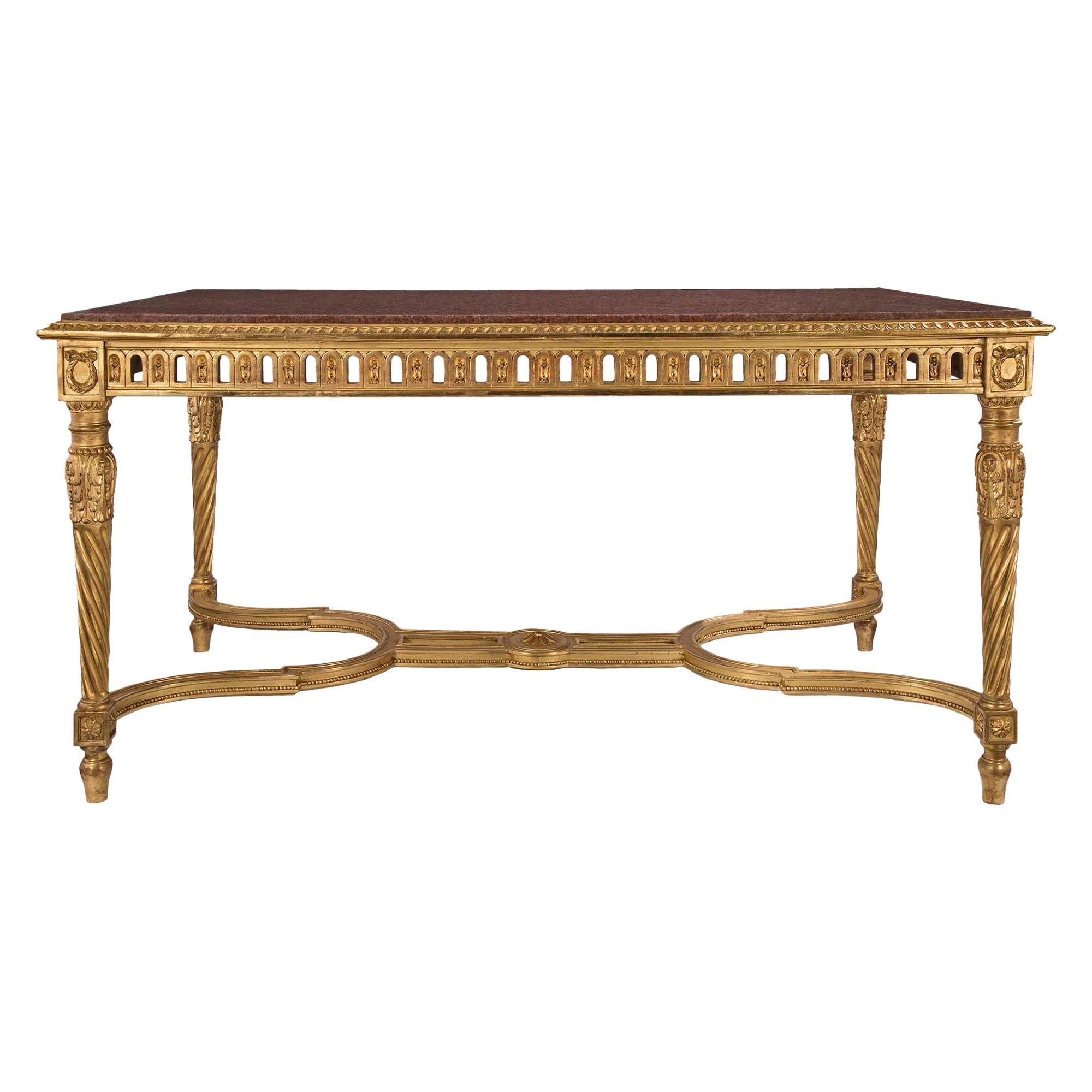Table centrale française de style Louis XVI du 19ème siècle en bois doré et marbre