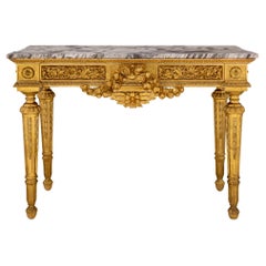 Console sur pied de style Louis XVI du 19ème siècle en bois doré et marbre