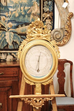 French 19th Century Louis XVI Style Giltwood Barometer with Carved Crest