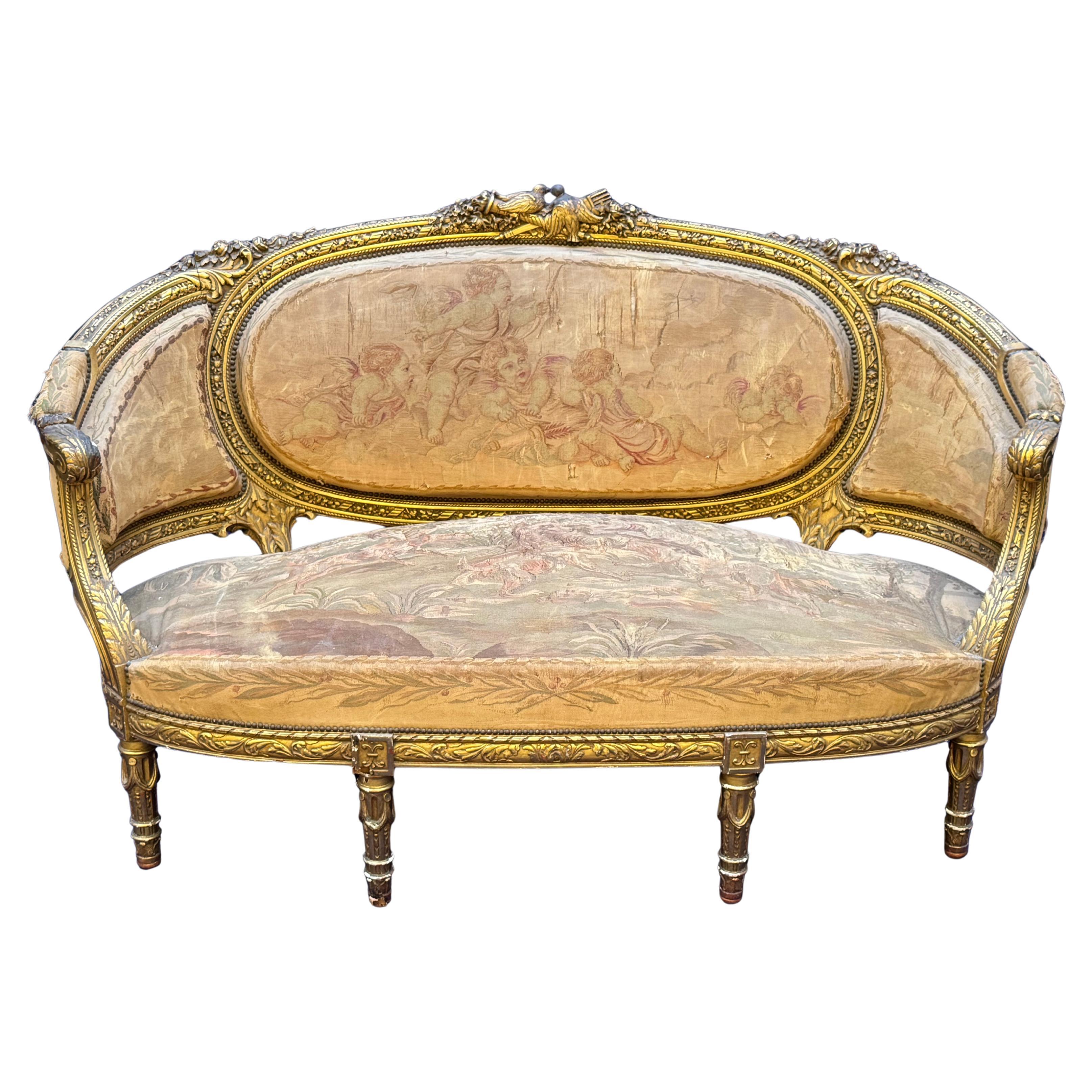 French 19th Century Louis XVI Style Giltwood Salon Suite with Tapestry Upholstery
An exceptional French Louis XVI style giltwood salon suite, dating from the 19th century, composed of a canapé and three fauteuils. This refined ensemble captures the