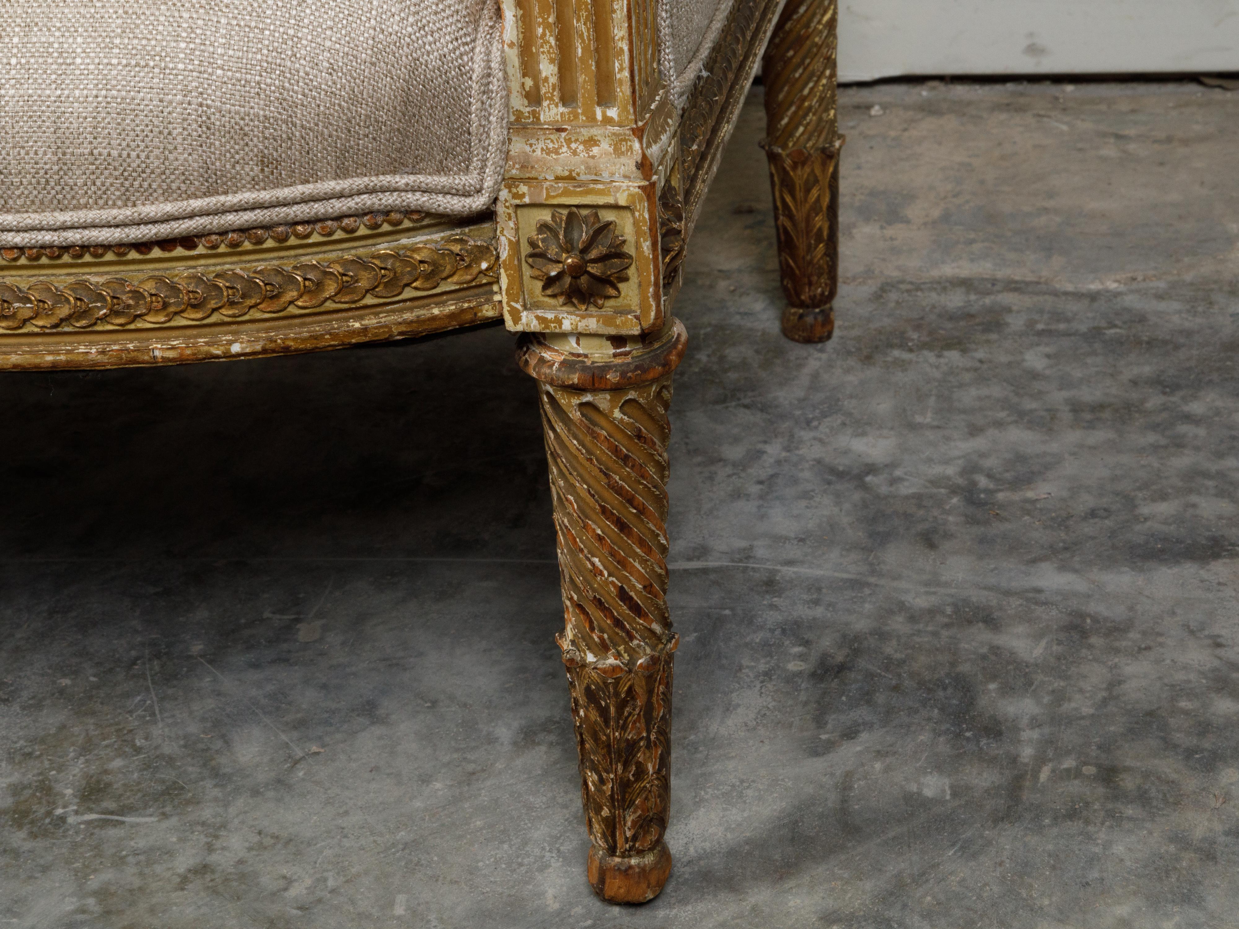 French 19th Century Louis XVI Style Giltwood Wingback Settee with Carved Motifs For Sale 6