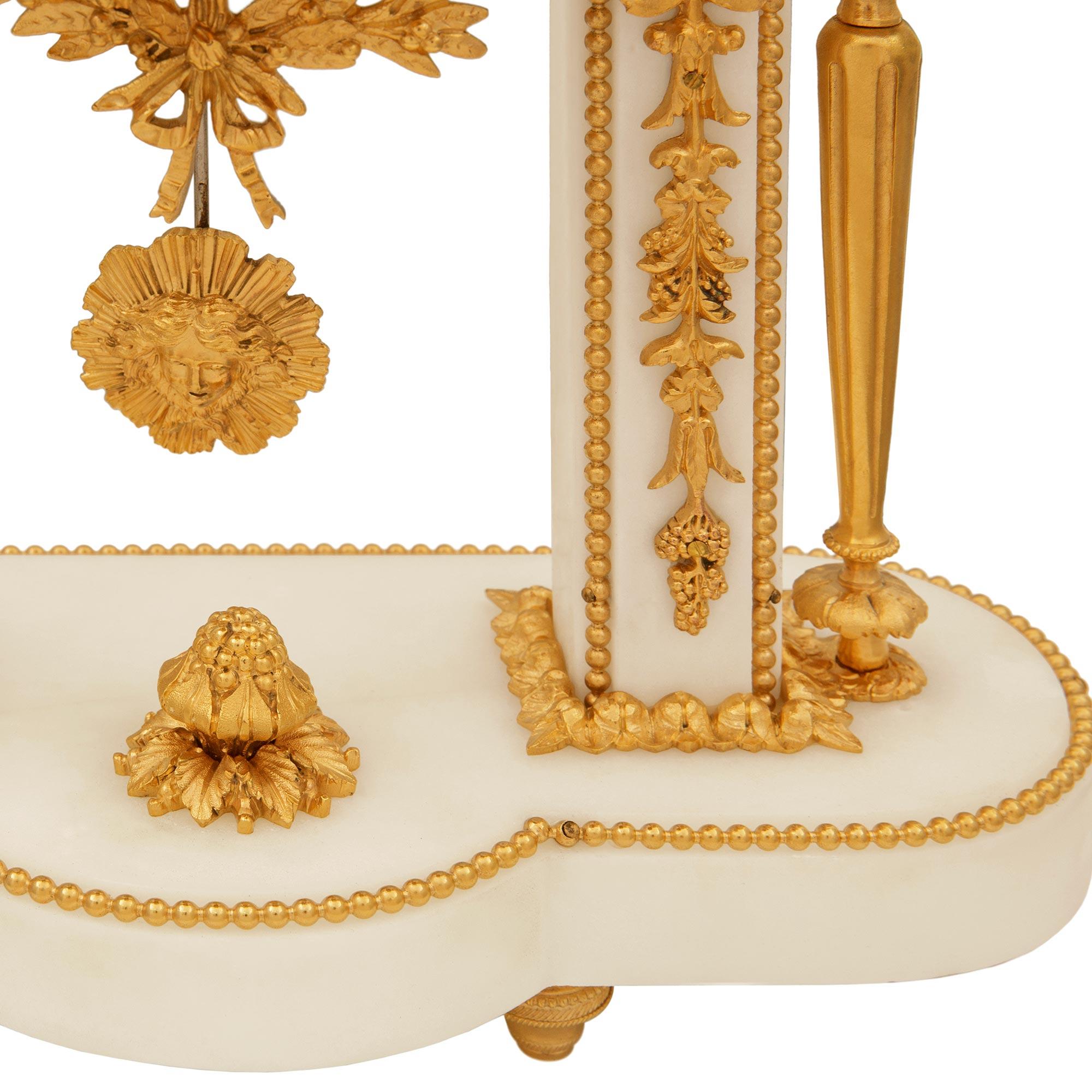 French 19th Century Louis XVI Style Marble and Ormolu Portique Clock For Sale 7