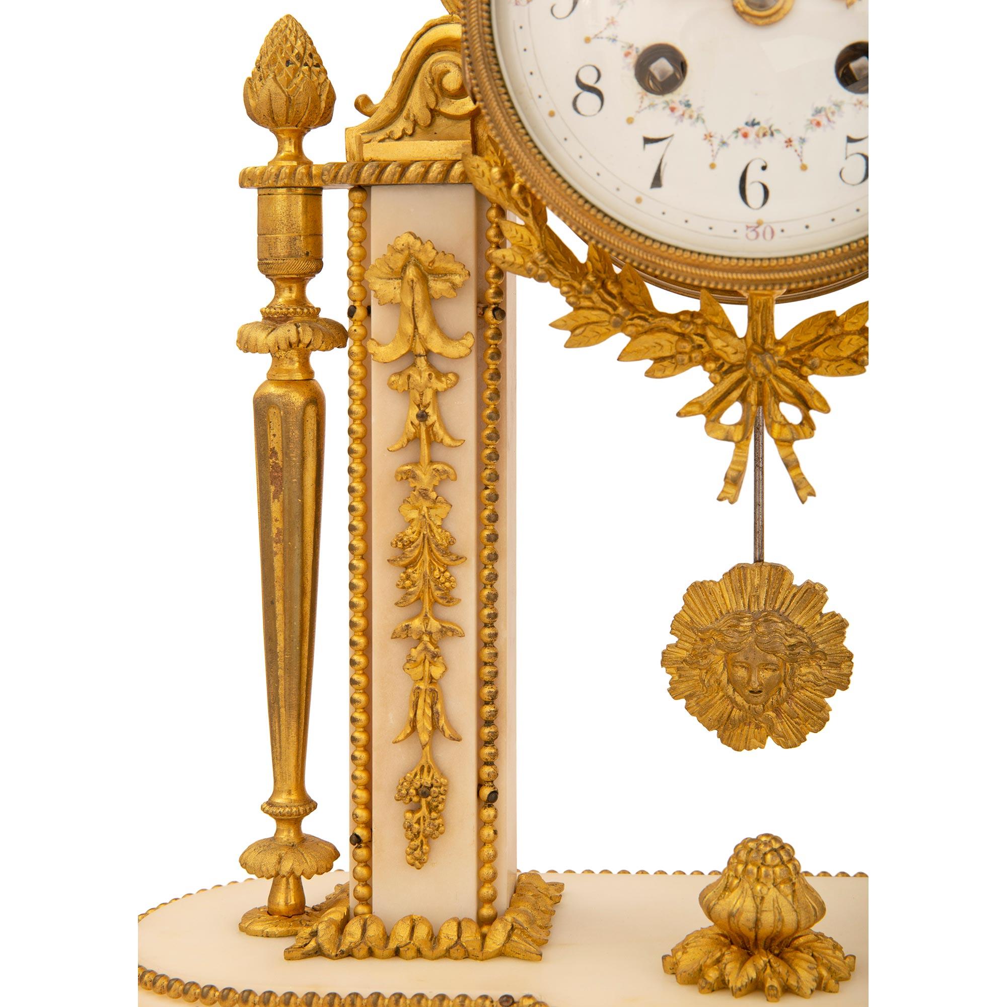 French 19th Century Louis XVI Style Marble and Ormolu Portique Clock For Sale 6
