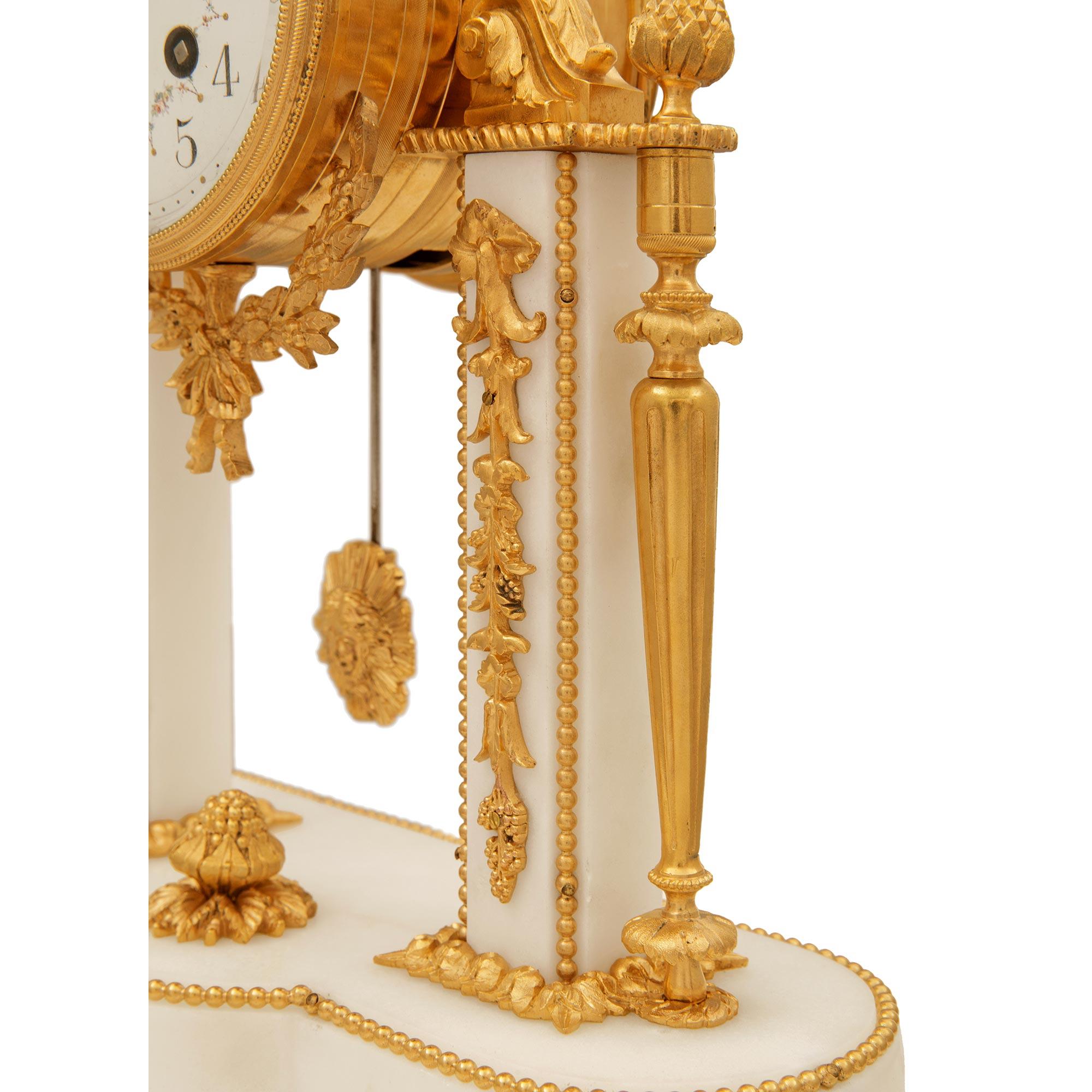 French 19th Century Louis XVI Style Marble and Ormolu Portique Clock For Sale 6