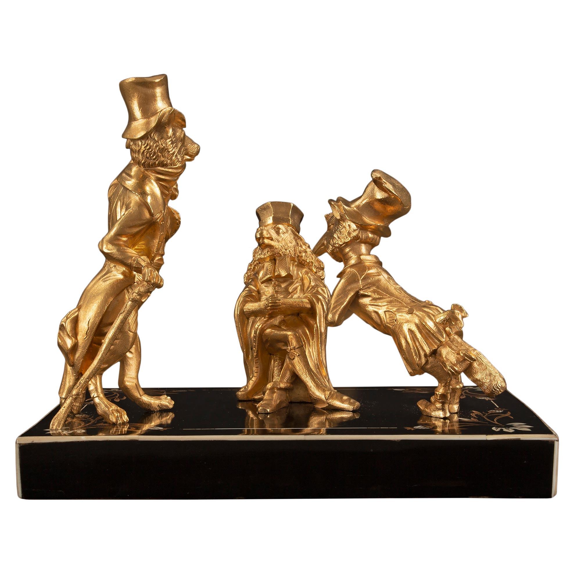 Charmant groupe de statues en bronze doré d'époque Louis XVI et Napoléon III, datant du XIXe siècle, représentant la fable de Jean de la Fontaine 