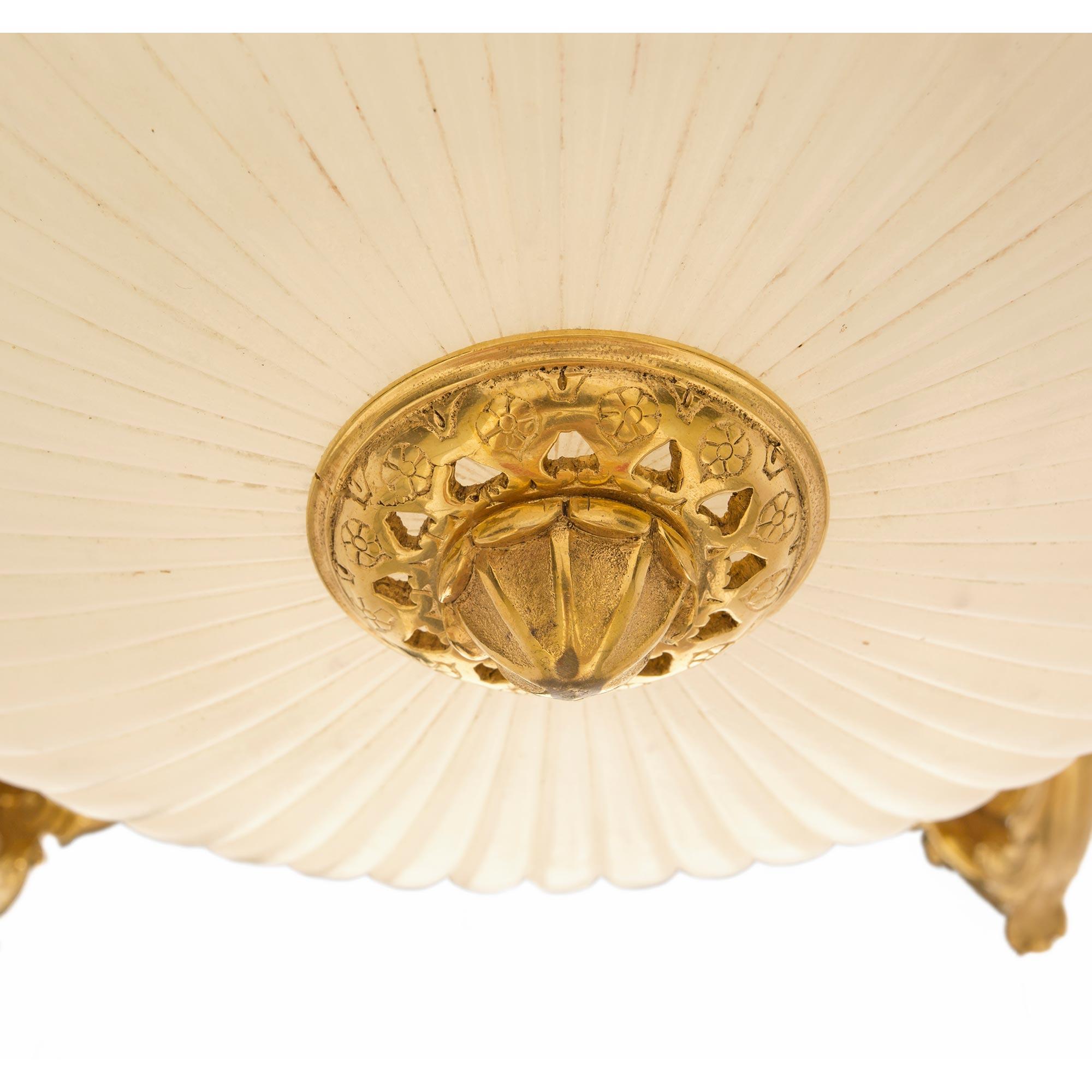 French 19th Century Louis XVI Style Ormolu and Alabaster Twelve-Light Chandelier For Sale 4