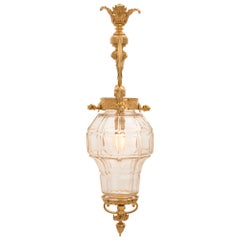 Farol francés del siglo XIX estilo Luis XVI de ormolu y cristal