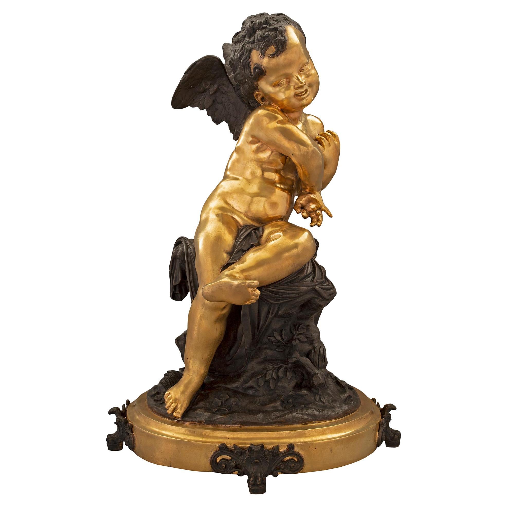 Statue française du 19ème siècle de style Louis XVI en bronze doré et patiné signée