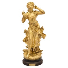 French 19th Century Louis XVI Style Ormolu and Patinated Bronze Statue