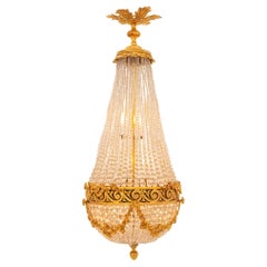 French 19th Century Louis XVI Style Ormolu, Bronze and Crystal Chandelier