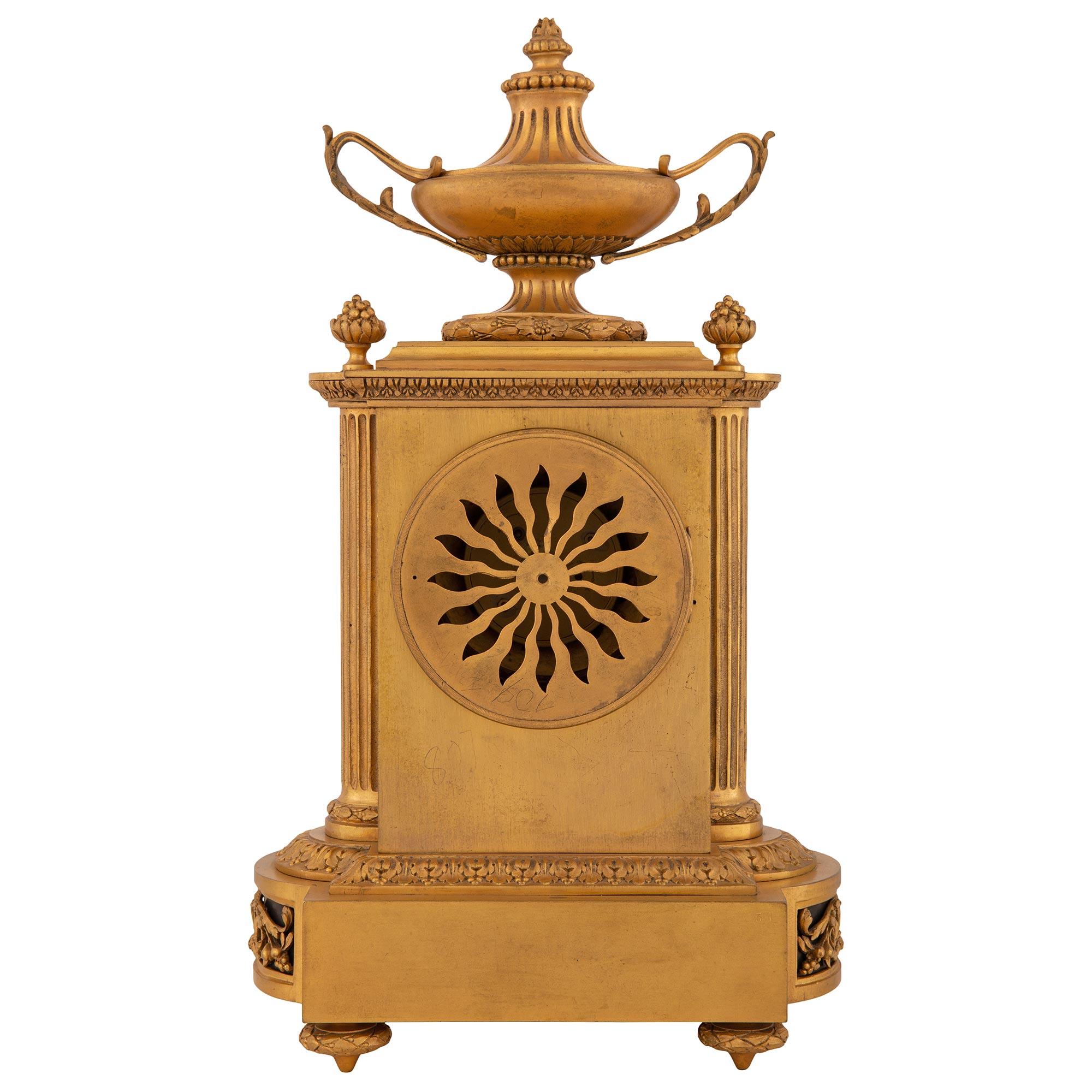 French 19th Century Louis XVI Style Ormolu Clock Signed 'Raingo Freres, Paris In Good Condition For Sale In West Palm Beach, FL