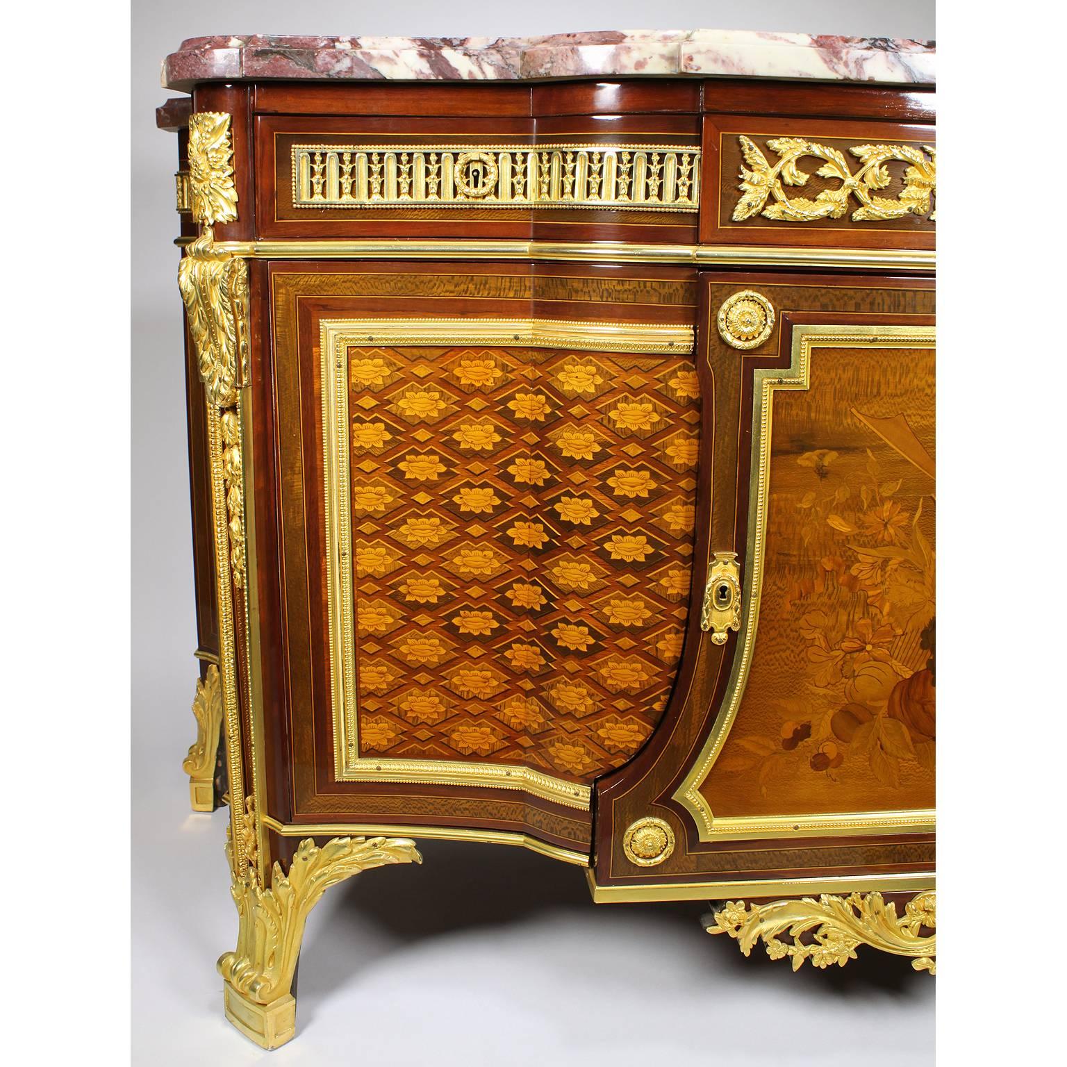 A fine French 19th century Louis XVI style ormolu-mounted mahogany, fruitwood and sycamore marquetry and parquetry commode with a Brèche Violette marble-top, after the model by Jean-Henri Riesener (1734-1806), circa 1880. The finely detailed commode