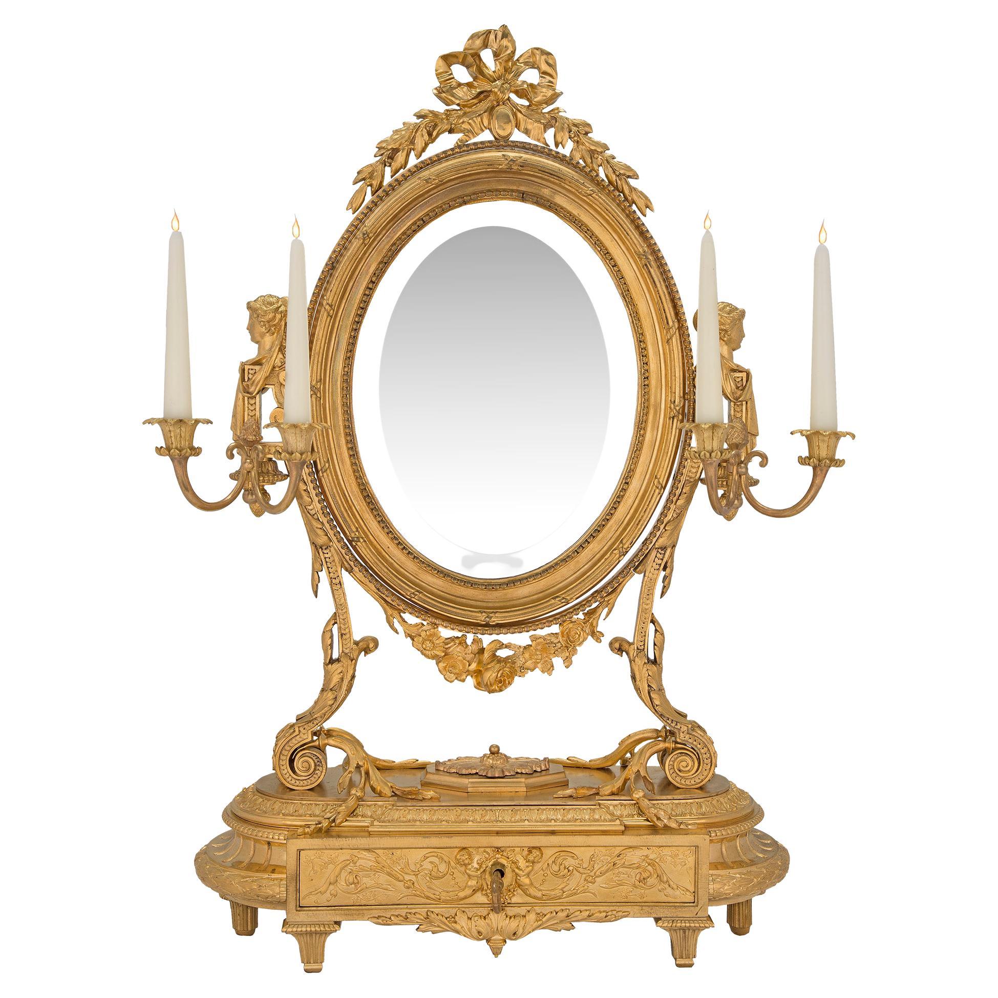 Miroir de coiffeuse en bronze doré de style Louis XVI du XIXe siècle français