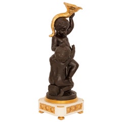 French 19th Century Louis XVI Style Patinated Bronze, Ormolu and Marble Statue