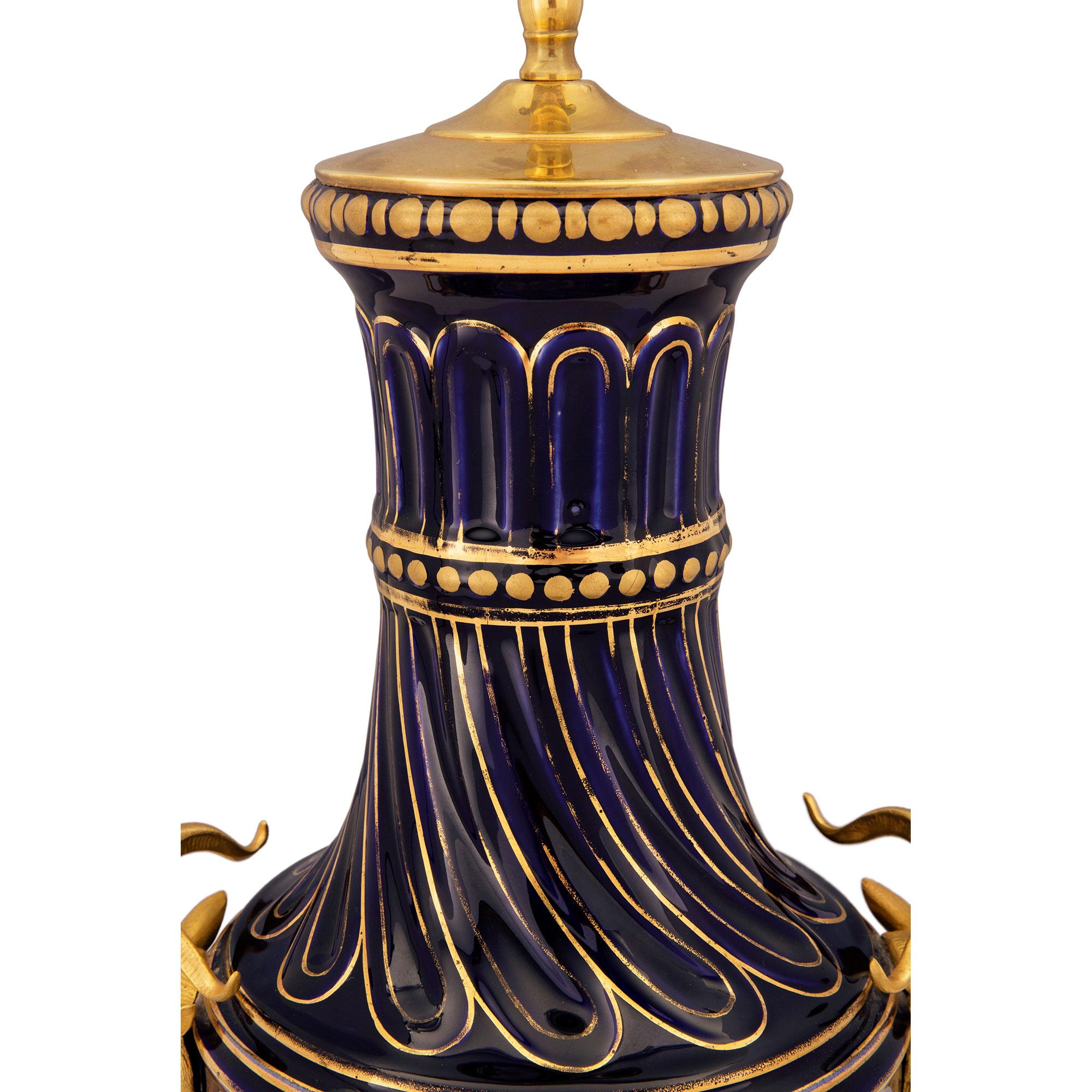 French 19th Century Louis XVI Style Porcelain, Gilt and Ormolu Lamp For Sale 1