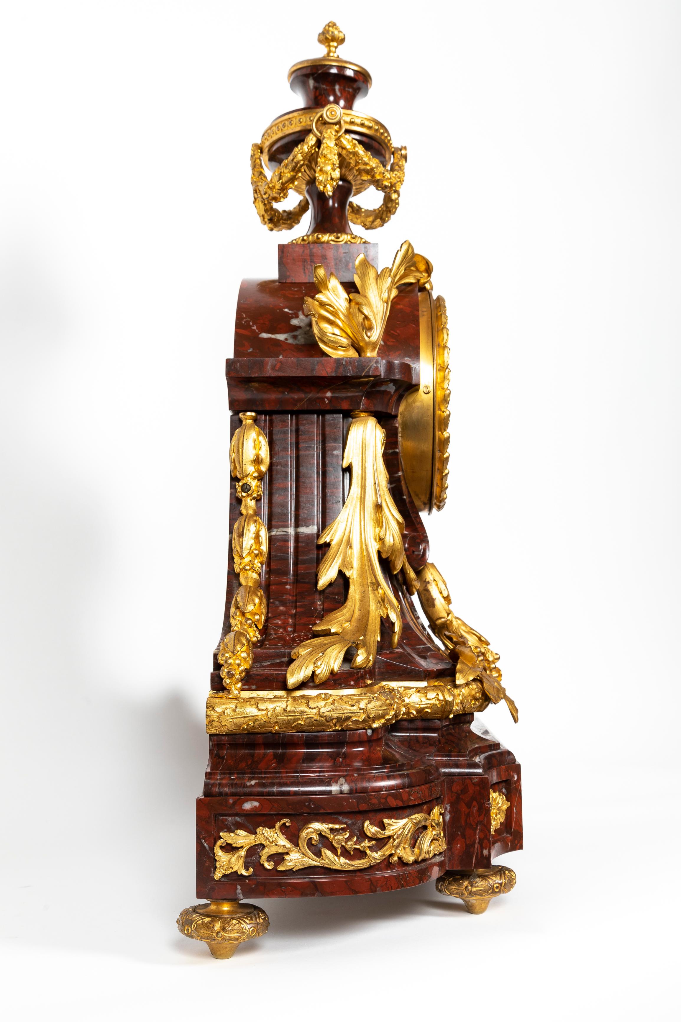 Gilt French 19th Century Louis XVI Style Rouge Griotte Marble and Ormolu Clock Set For Sale