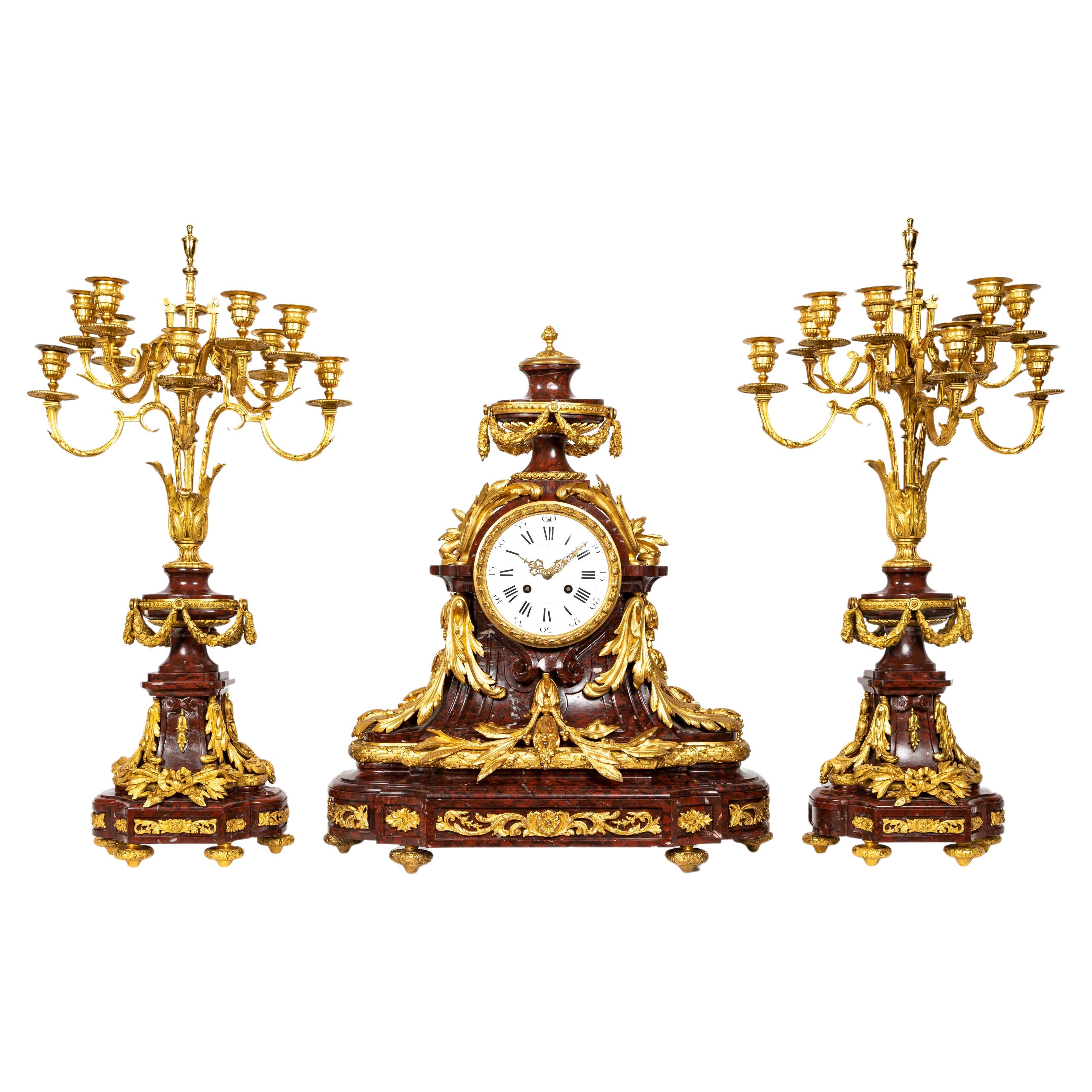 French 19th Century Louis XVI Style Rouge Griotte Marble and Ormolu Clock Set For Sale