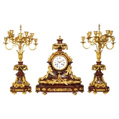 French 19th Century Louis XVI Style Rouge Griotte Marble and Ormolu Clock Set