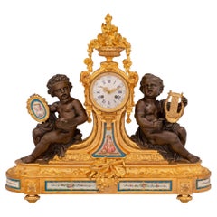 Antique French 19th Century Louis XVI Style Sèvres Porcelain and Ormolu Clock